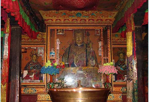 Altar with Guru Padmasambhava in Dzogchen Gompa.